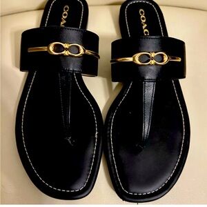 Brand new never worn coach sandals, size 9 in box
